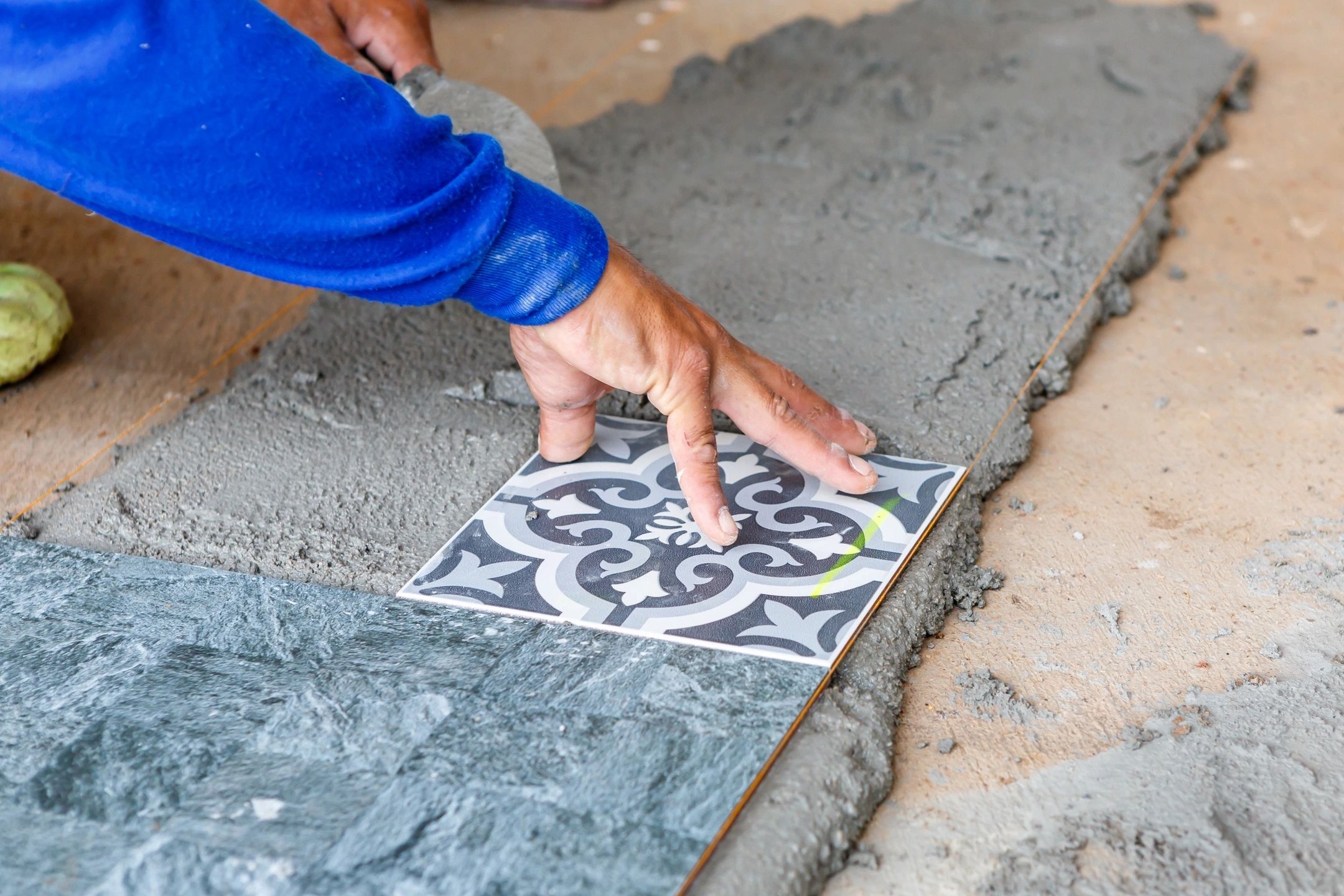 Natural stone tile flooring installation in a luxury home
