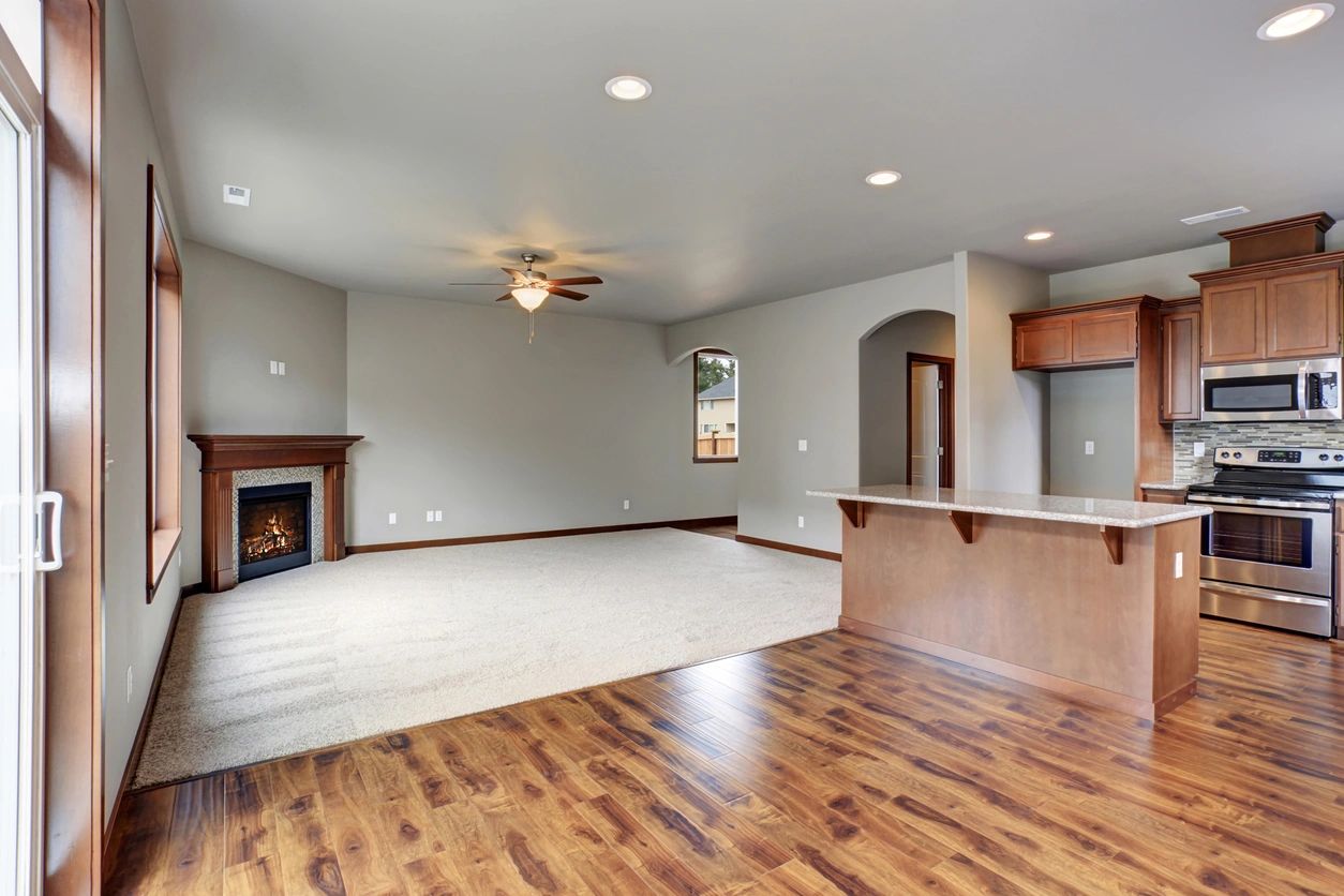Close-up of durable luxury vinyl plank flooring in a rental unit kitchen